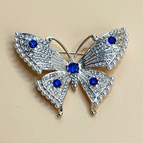 Silver tone butterfly - tone,